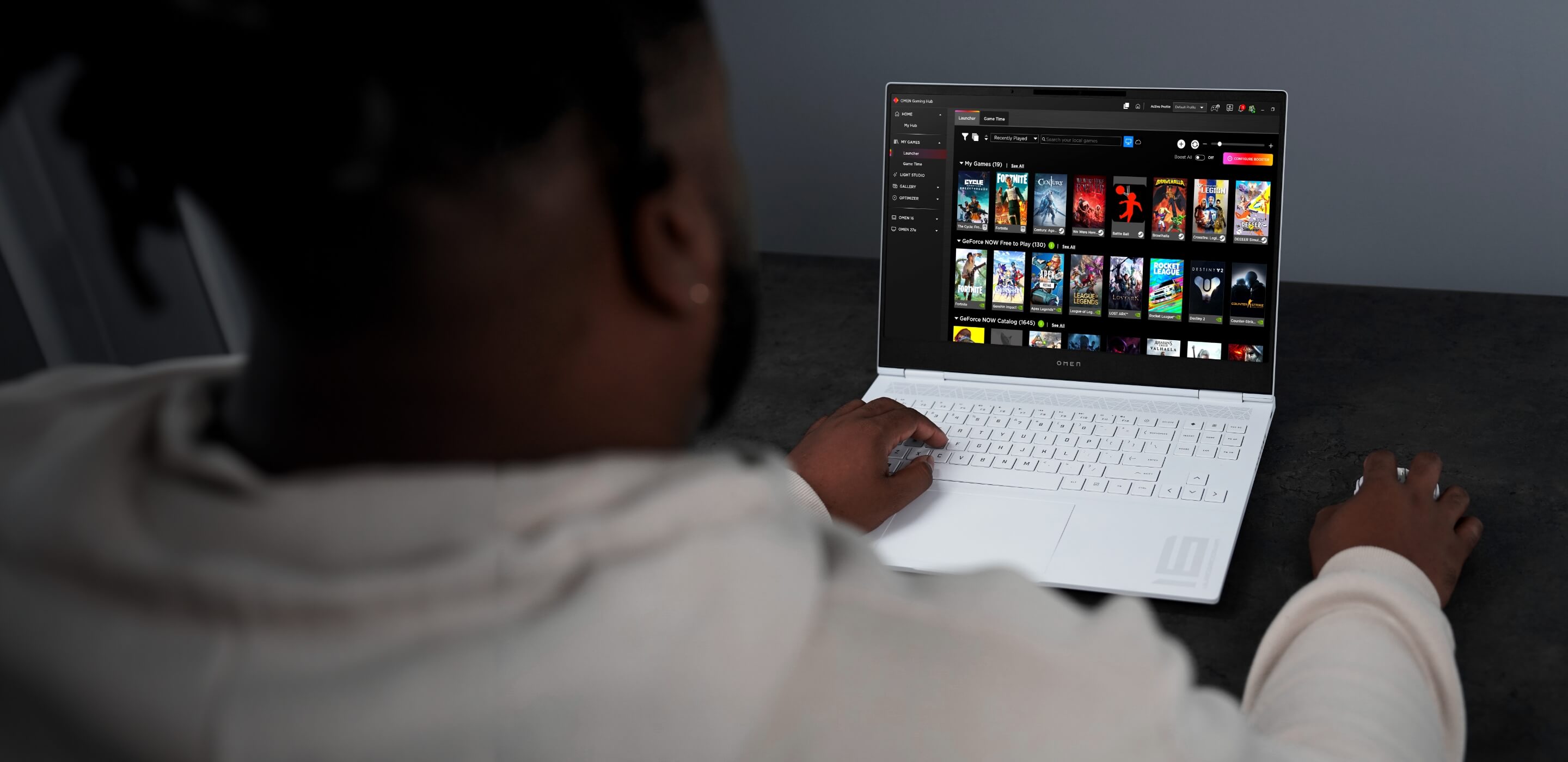 MYGAMES launcher UI on OMEN Transcend 16 GAMING LAPTOP IN MODERN SETTING