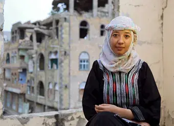 Olla Alsakkaf poses for a portrait in Yemen