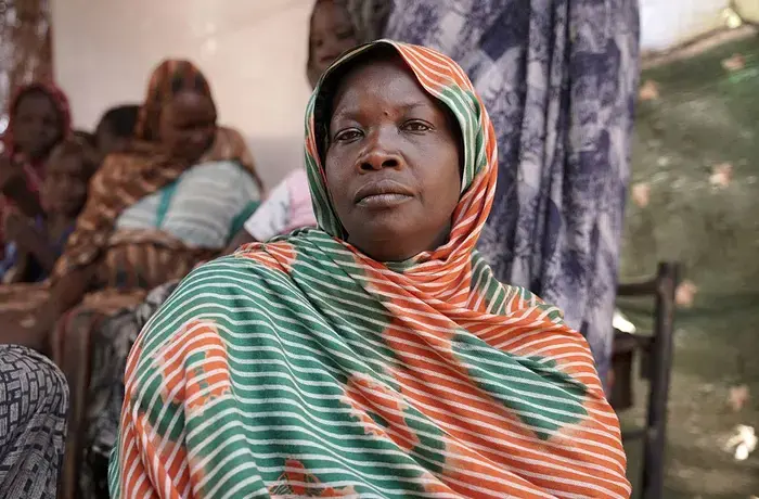 Nassim, 28 years and a mother of five children at the Tambasi centre for displaced families in El Fasher, North Darfur. Photo: UNICEF/UNI569483/Mohamed Zakaria